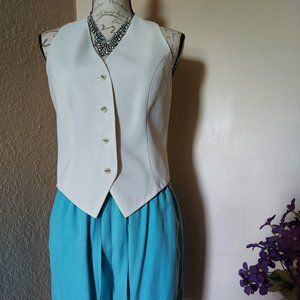Cream fully lined rayon vest; all buttons intact.